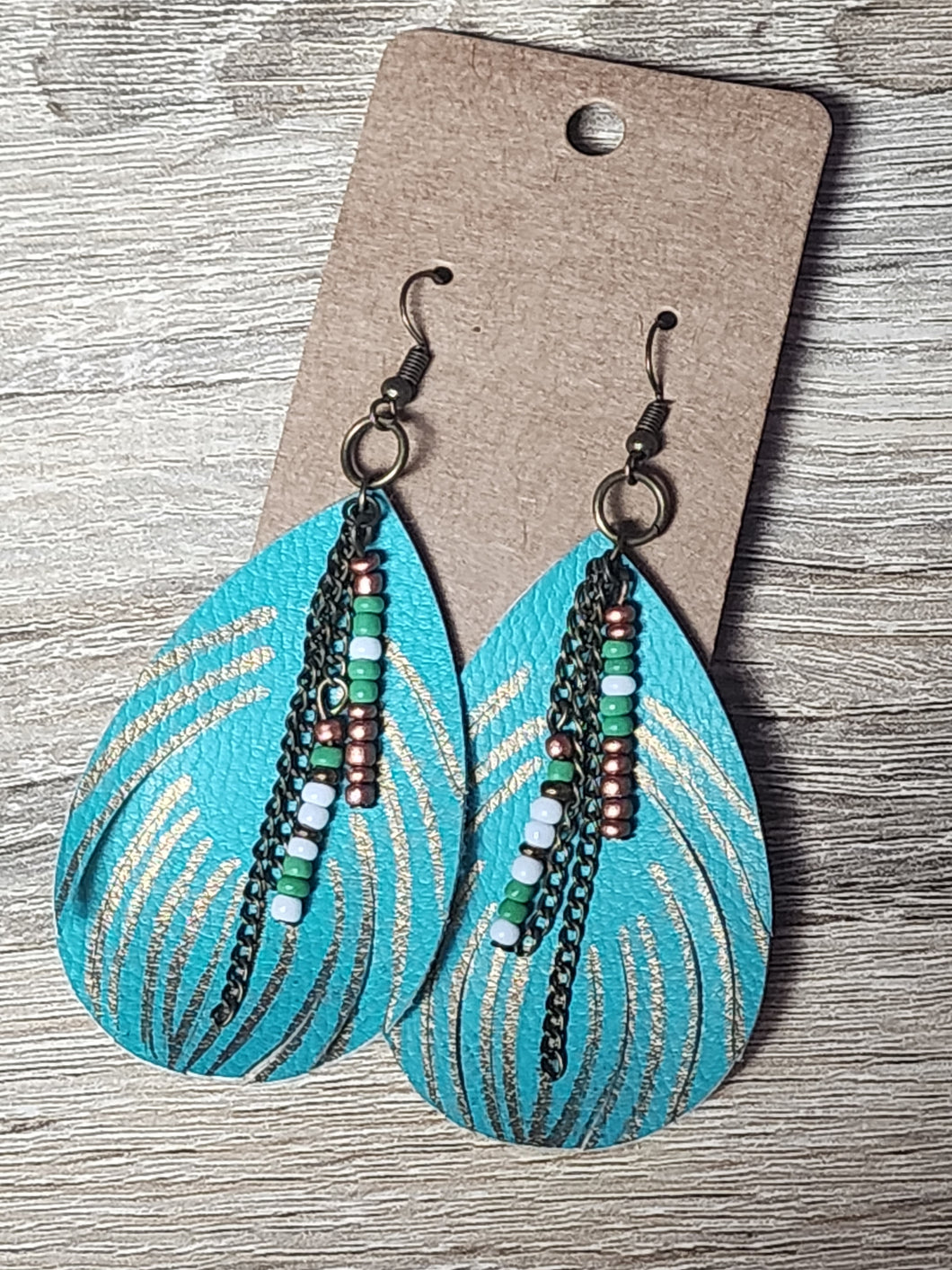 Leather feather fringe with beads