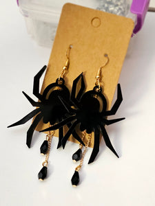 Acrylic spider with bead dangle