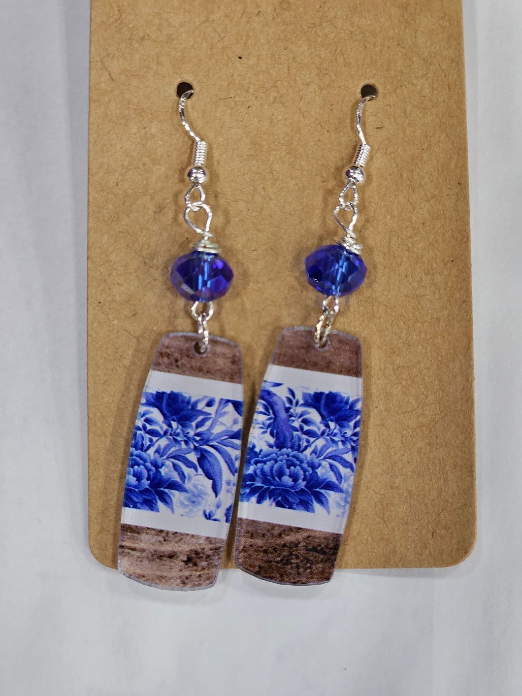 Blue tropical print with wood grain.