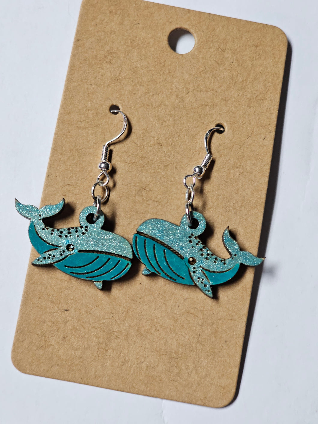 Painted wood whale earrings