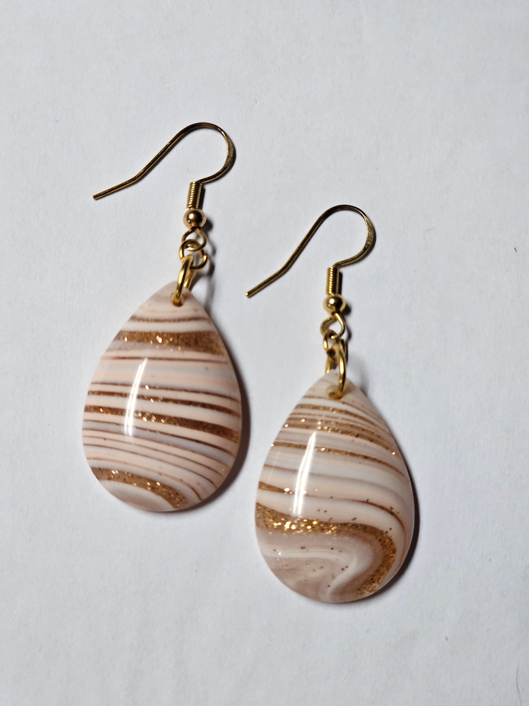 Gold, orange and cream swirl stone dangle