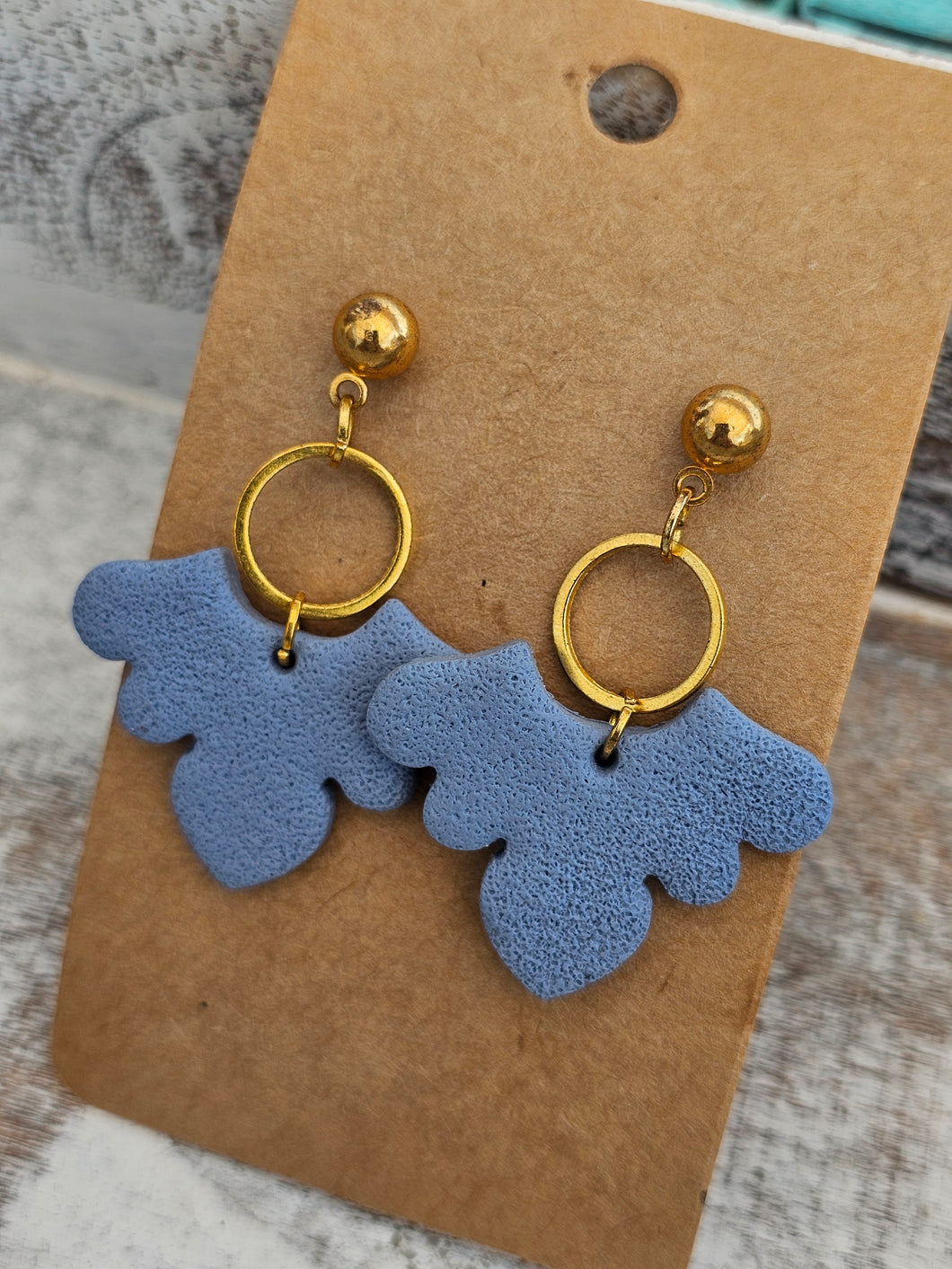 Blue clay with gold post connector