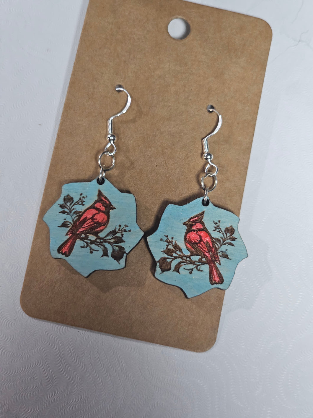 Cardinal on branch, painted wood