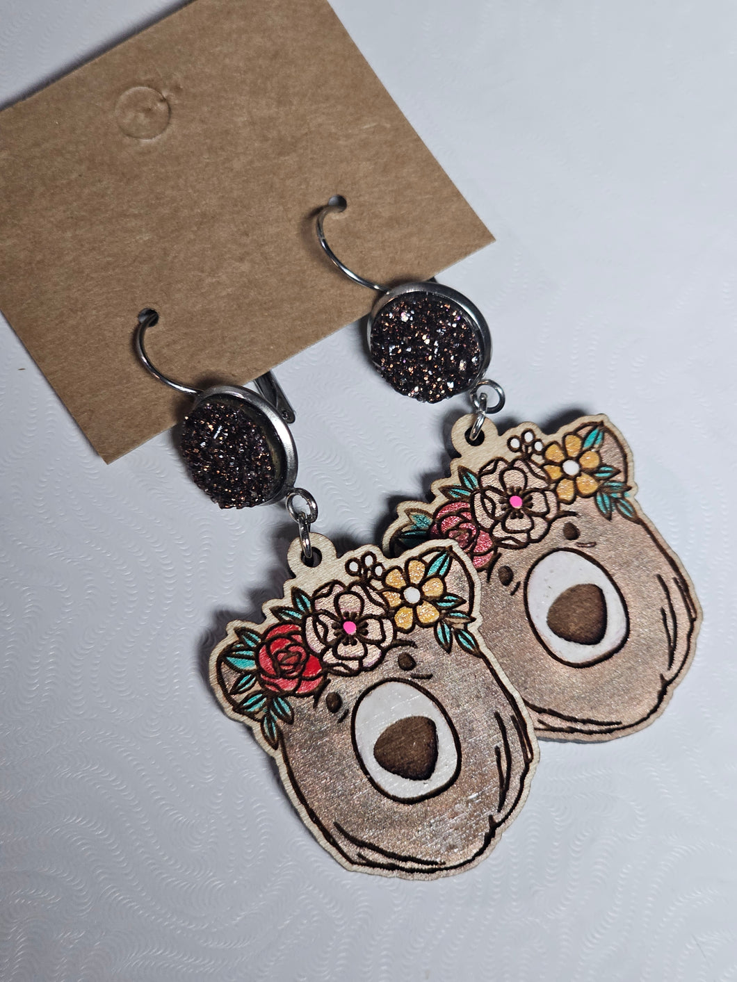 Painted wood floral bear with druzy