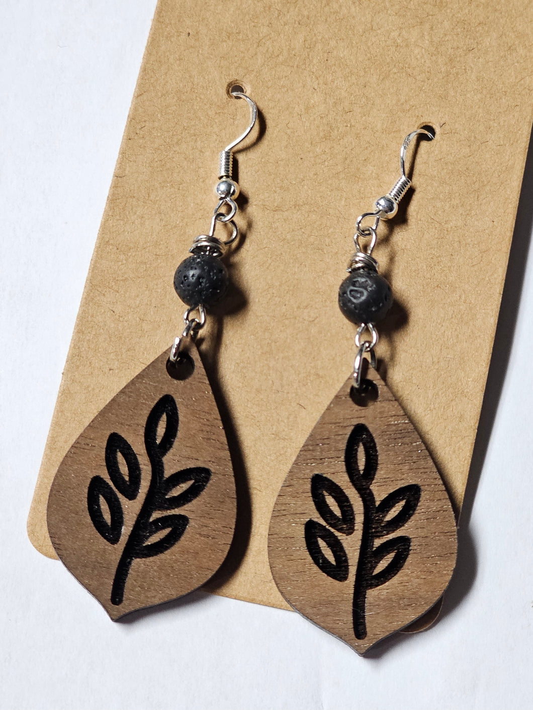 Leaf wood cut out with lava bead connector